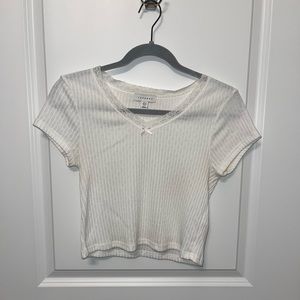 TopShop white crop tee with lace and bow detail